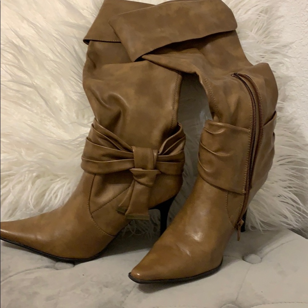 High heeled boots.
